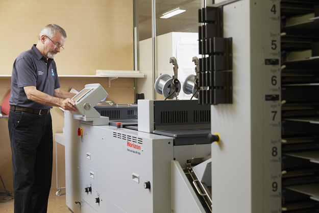 Digital finishing equipment at Advance Press factory